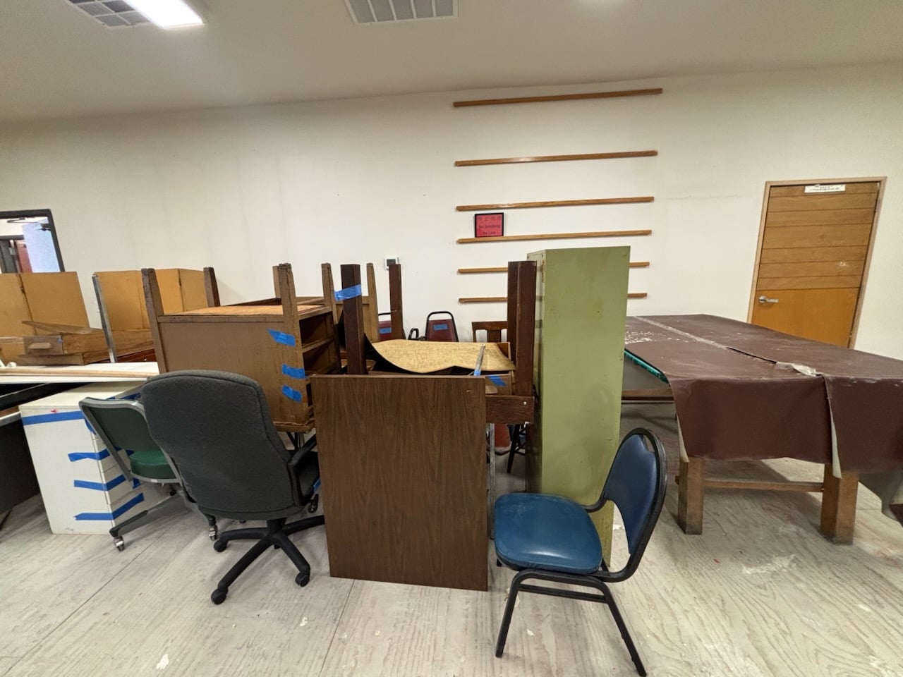 Mixed apartment furniture prepared for removal