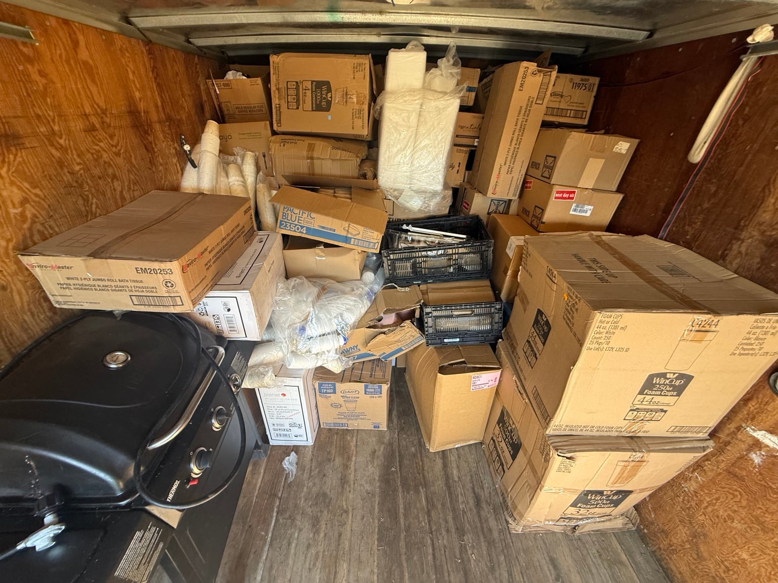 JunkPDX commercial hauling truck loaded with boxes and bulky materials
