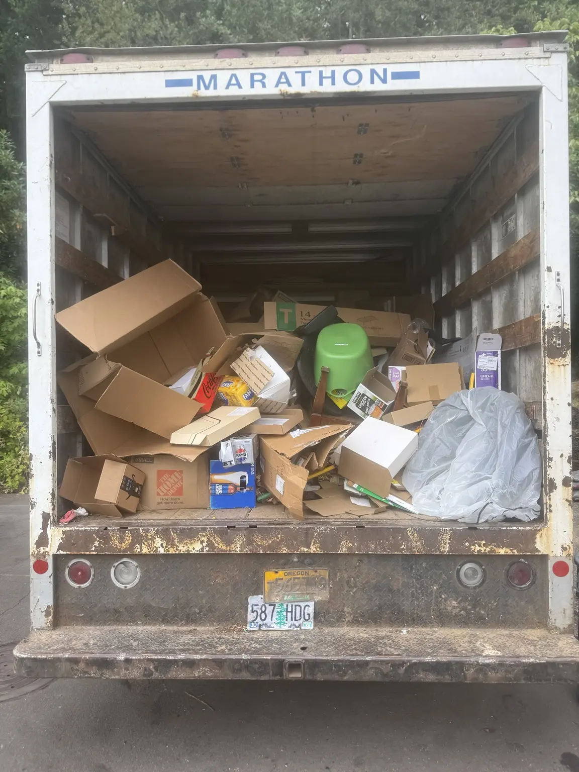 Household contents loaded inside the JunkPDX box truck during a real cleanout