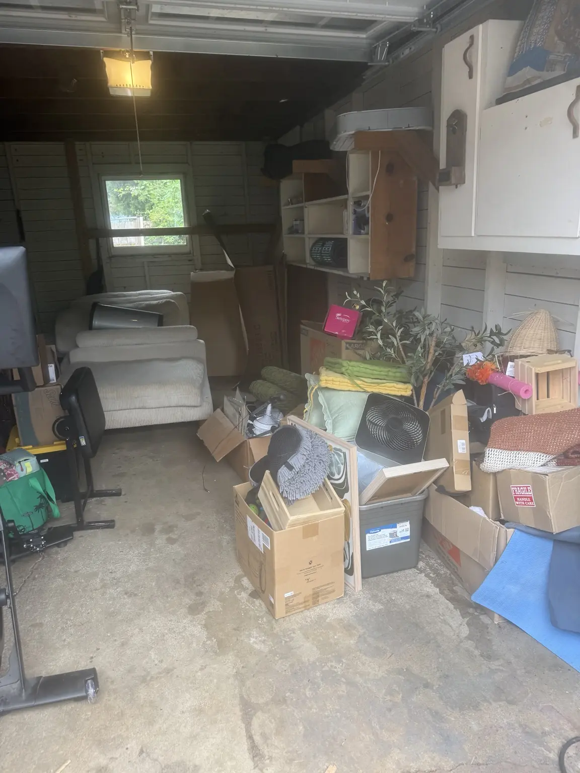 Garage before a JunkPDX cleanout